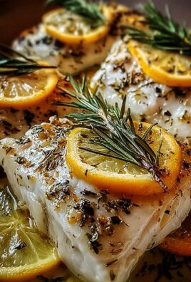 Ofenfisch mit Kräutern und Zitronen