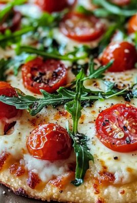 Pizza mit körnigem Frischkäse für Low Carb Genuss